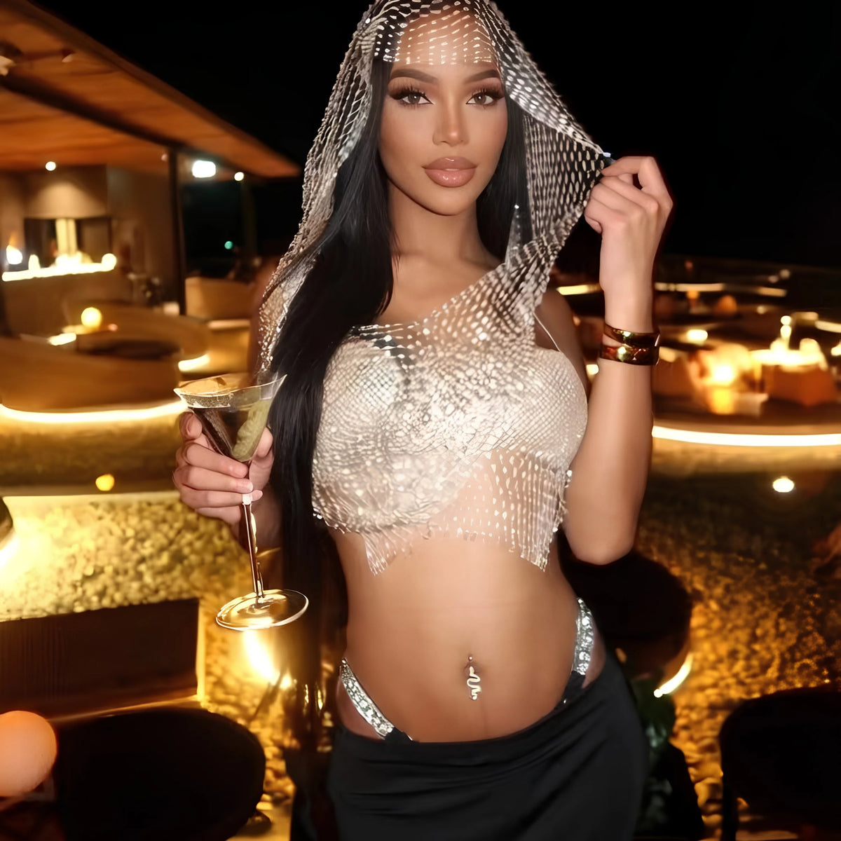 Rhinestone chain crop top with a draped head cover and sheer mesh fringe.