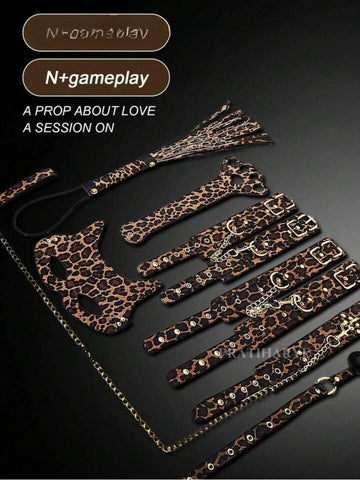 Leopard print BDSM accessory set with straps and metal-ring hardware