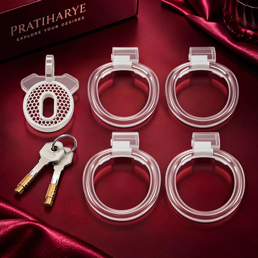 Transparent plastic chastity cage with circular frame and key lock, front view