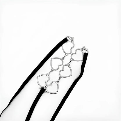 Black thong with silver heart charm chain detail across the front