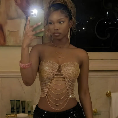 Champagne gold rhinestone strapless corset top with central ring detail and layered chain drape