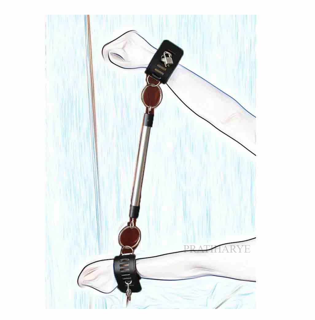 Black leather hand and ankle cuffs with metal spreader bar worn on legs