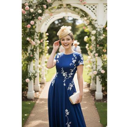 Elegant Beige Floral Fascinator with Net Veil
