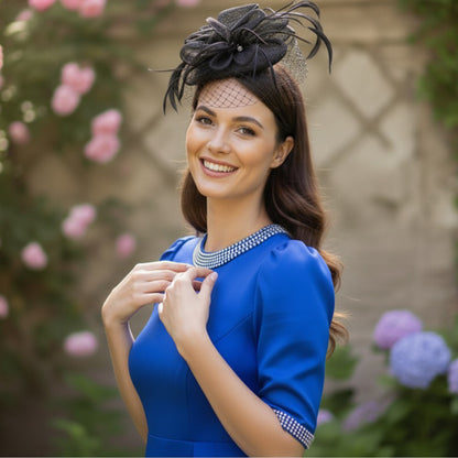 Elegant Black Feather Fascinator with Net Veil