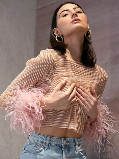 designer chain outfits women
metallic body chain women
party wear chain body fit
trendy body chain fashion
Premium Feather Cuff Sheer Mesh Top