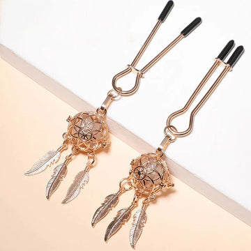 Gold round nipple clamps with dreamcatcher charm and feather dangles, LED tips